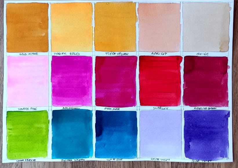 Foto de un papel con muestras de 15 colores. Cada color tiene el nombre debajo y van desde amarillo a violeta pasando por azul, rojo, verde, rosa...